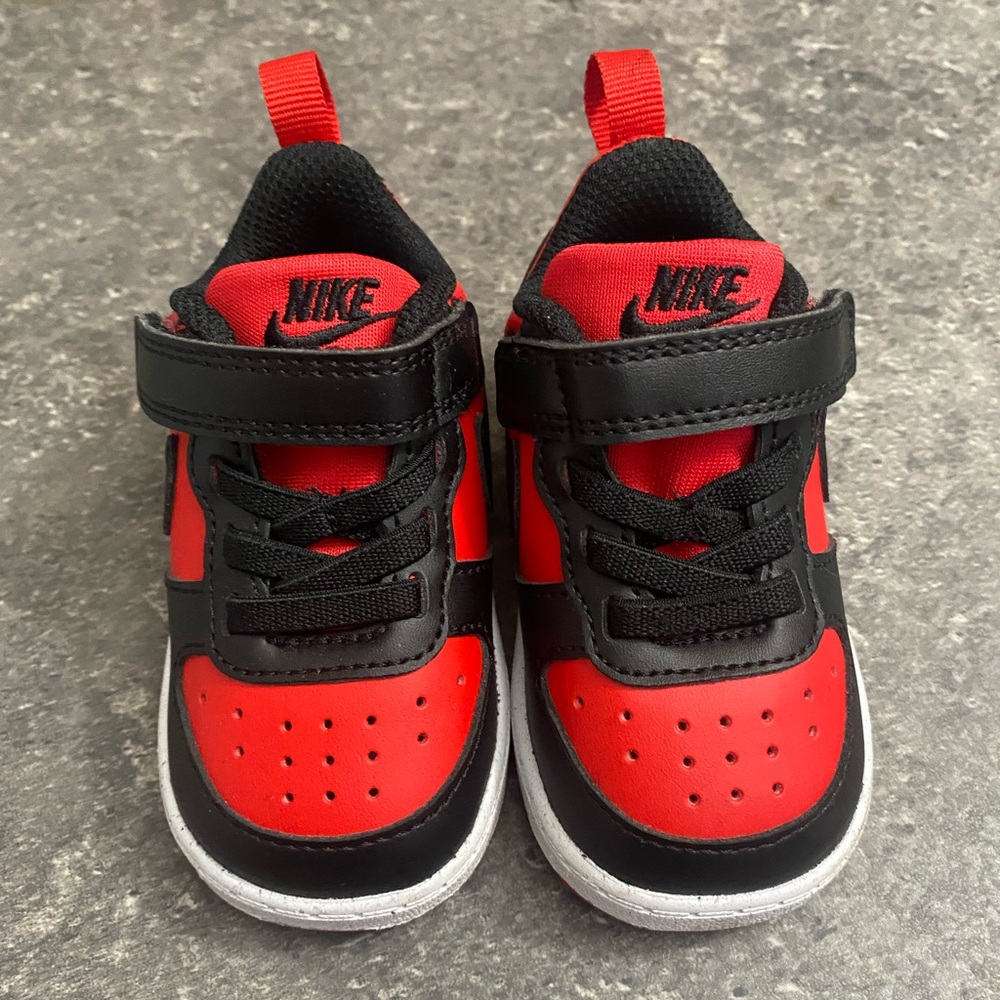 Red and Black Nike shoes